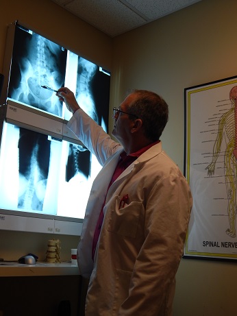 Dr. Greg reviewing X-rays